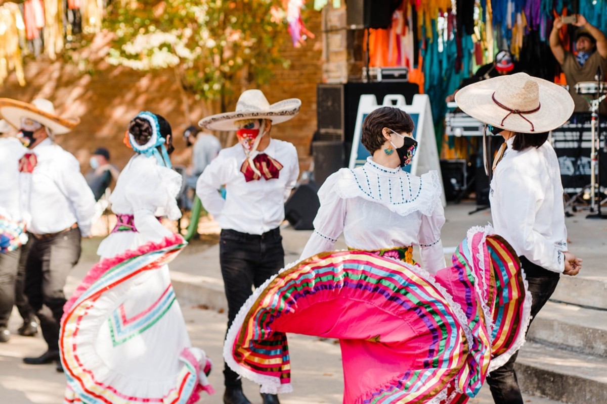 People dancing at a festival.