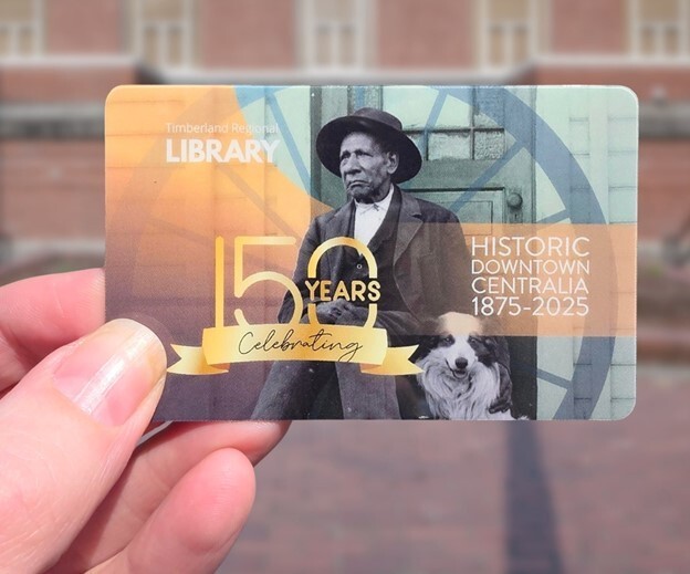 Library card featuring a photo of George Washington and the words "Celebrating 150 years"