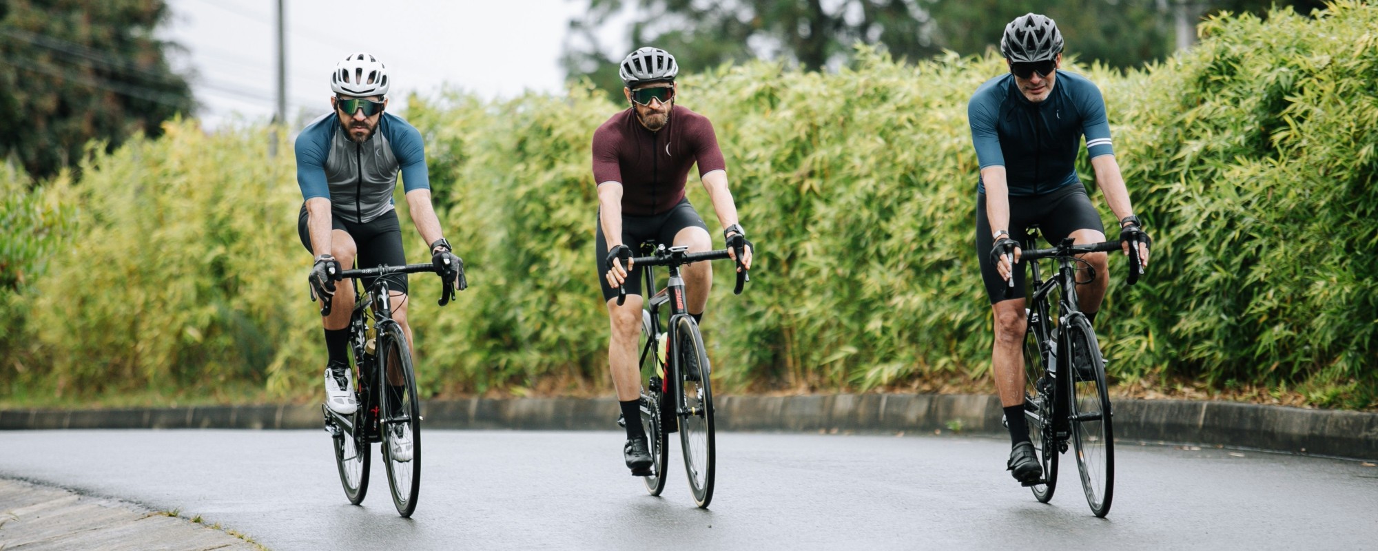People cycling on a protected bike path