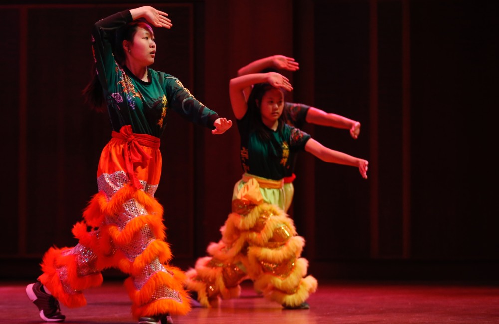 Dancers perform.