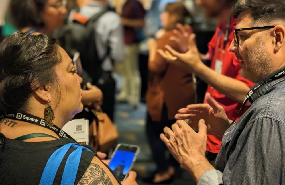 People engaged in conversation.