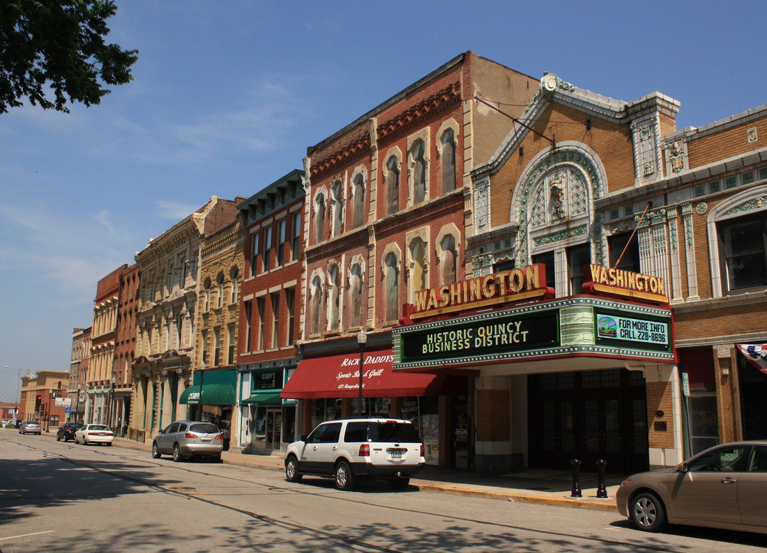 Historic theater marquee and historic building facades in Quincy, Illinois