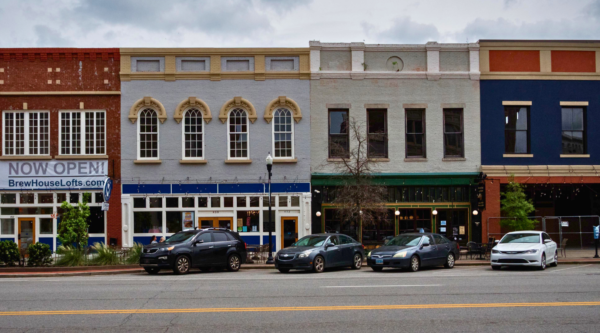 A row of historic buildings with colorful facades